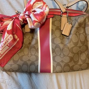 Coach tote- tan, brown, pink & white with decorative Coach bow.